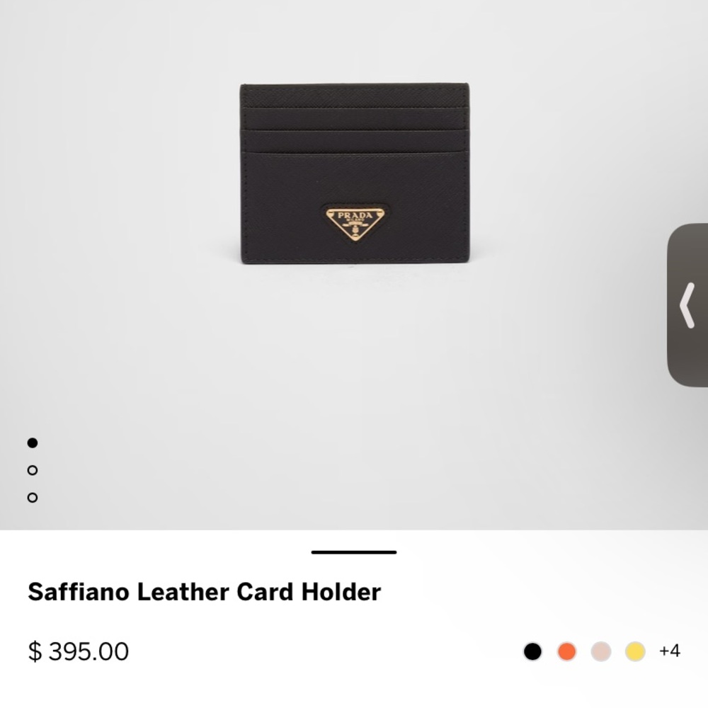 Prada CardHolder.Black.Gold Hardware.Retail price $395.ExcellentCondition.Unisex